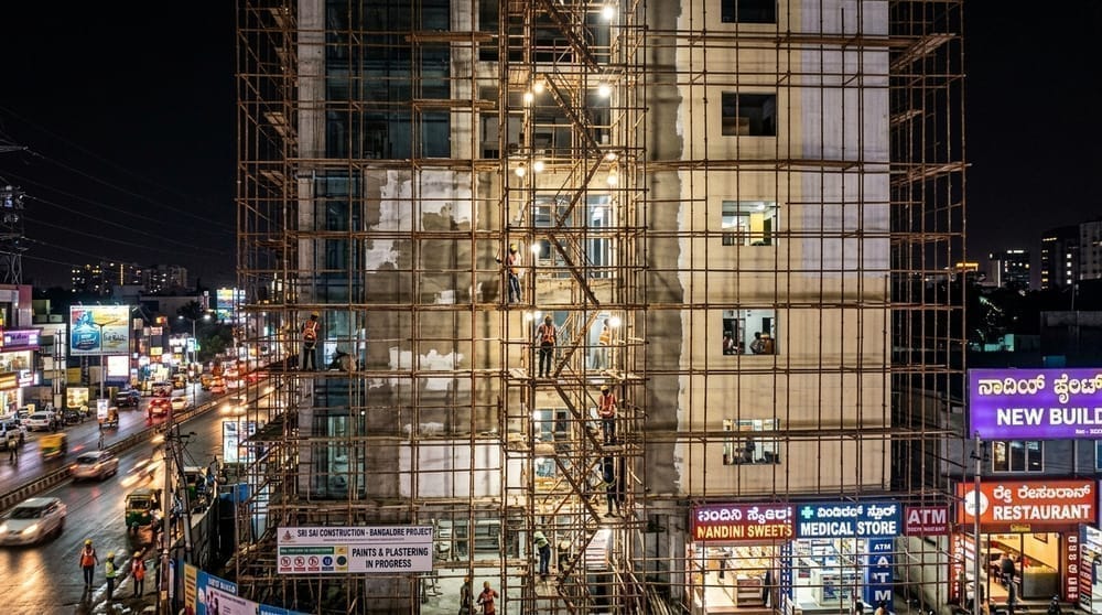Facade scaffolding tower for multi-story building exterior in Koramangala