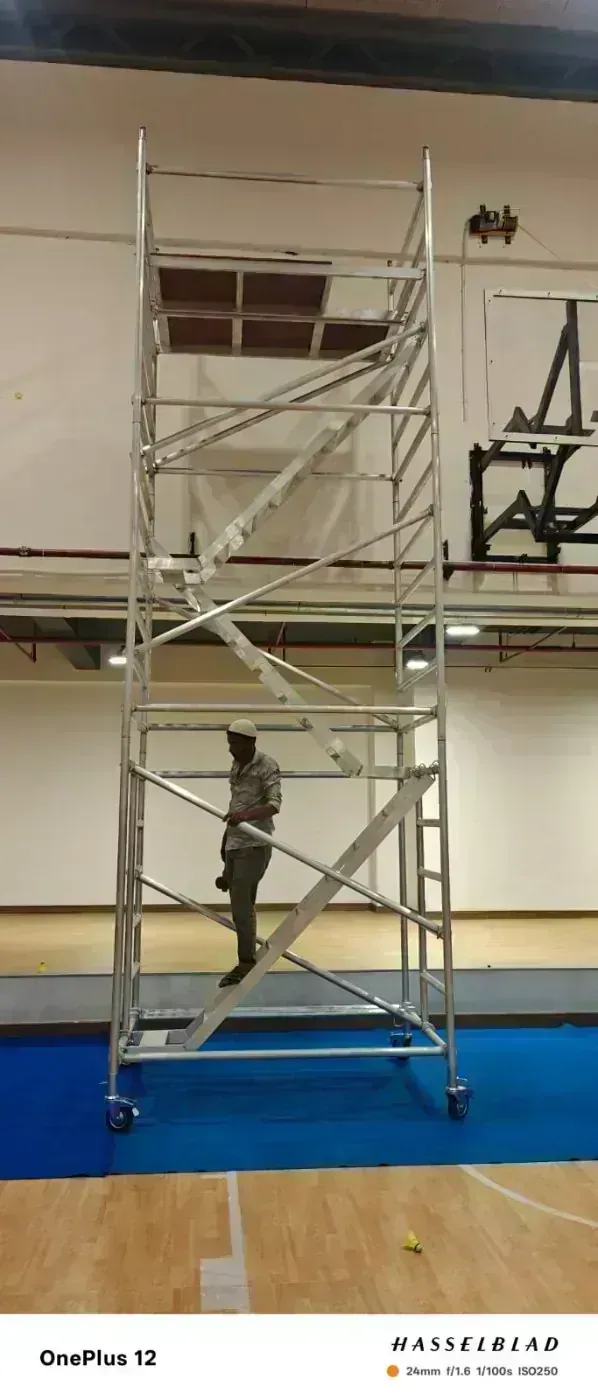 Modular aluminium ladder frame section with ribbed anti-slip rungs and snap lock braces